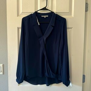 Navy blue blouse. Front cross